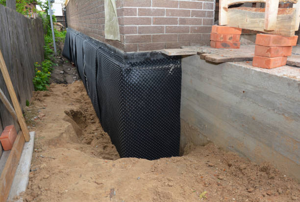 SJ Waterproofing Pros technician performing targeted Sump Pump Installation assessment in District Heights, MD